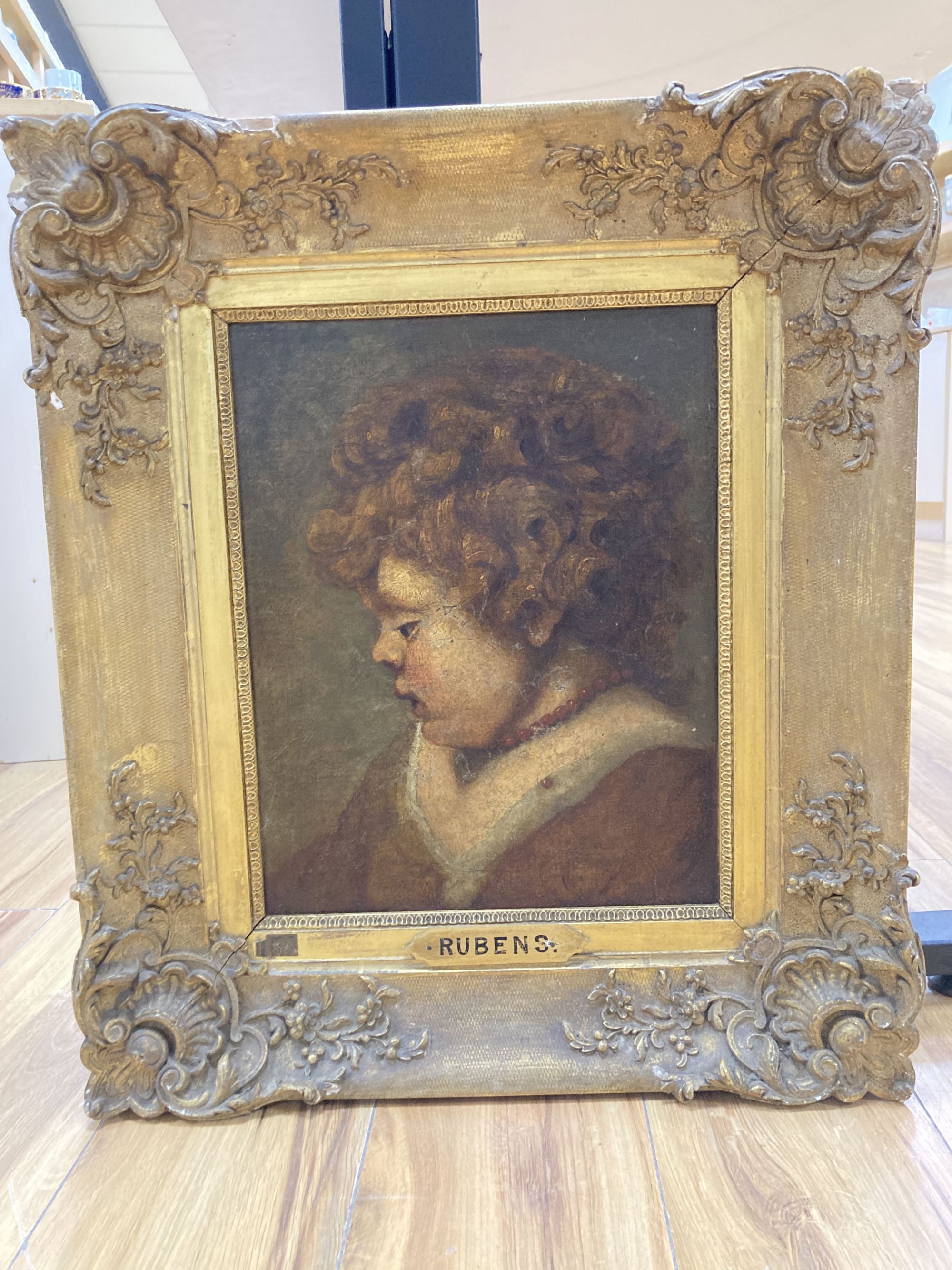 After Rubens, oil on canvas, Study of a curly haired child wearing a coral bead necklace, 36 x 28cm, Christies stencil stamp verso